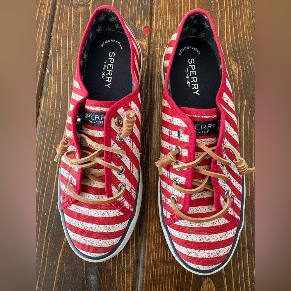 Red and white striped Sperry Top-Sider women's sneakers with leather laces